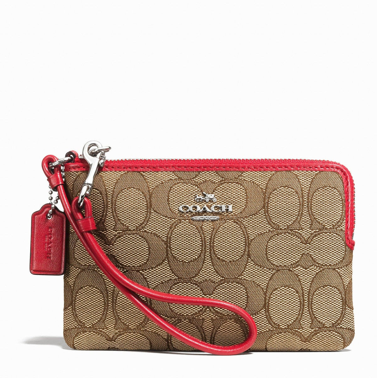 Coach corner zip wristlet in signature fabric